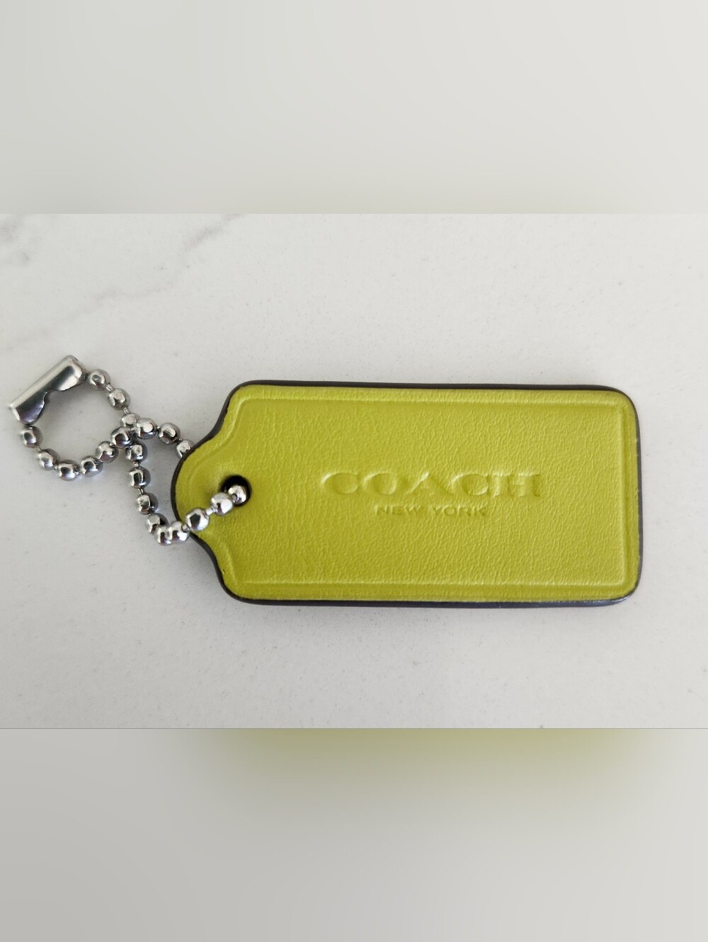 COACH Lime Leather Hangtag